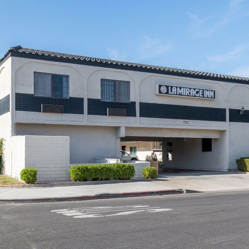 The image shows a two-story building with the signage 