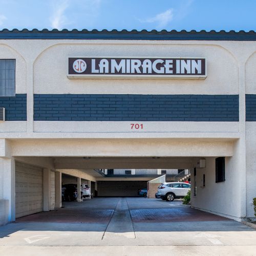 The image shows the entrance of a building labeled 